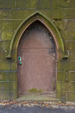 old metal door to a crypt