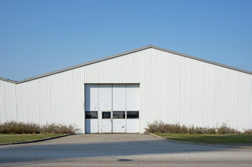 Fototapeta na wymiar Warehouse, blue sky