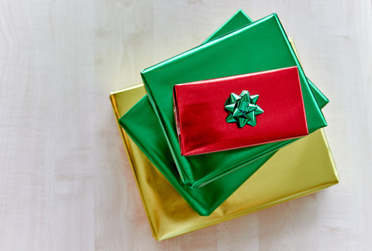 Top view showing gift boxes on wooden background
