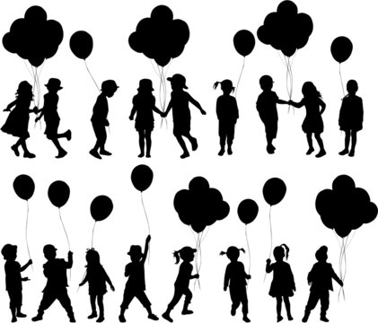 Silhouettes of children with balloon.
