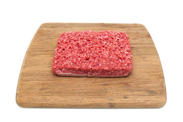 minced beef on a cutting board. white background.