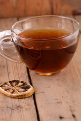 Fototapeta premium A cup of tea on wooden background