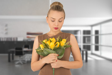 young woman with a bouquet of yellow flowers