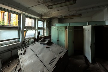 Dark room with steel lockers