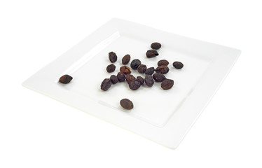 Saw palmetto berries on a square plate