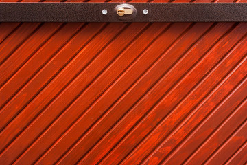 Lock on red wooden door