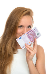 Happy young woman holding up cash money five hundred euro