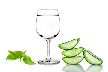 green aloe vera ,glass of water and tea isolated on white backgr