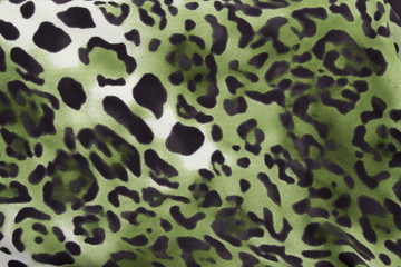 Beautiful green animal print leopard background / wallpaper