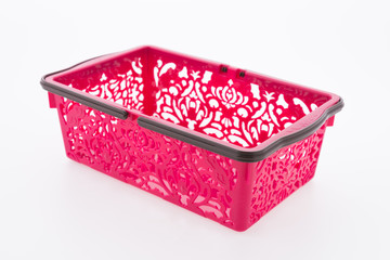 Shopping plastic basket isolated on white background