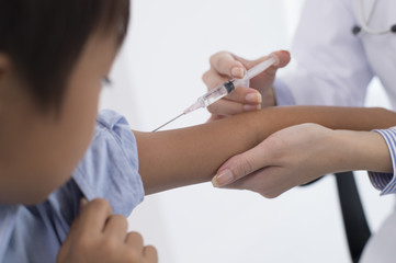 Children receive an injection