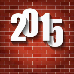 Fototapeta na wymiar Paper numbers of new 2015 on a brick background