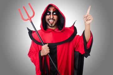 Man devil in red costume
