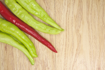 Fresh red and green goat pepper on corner