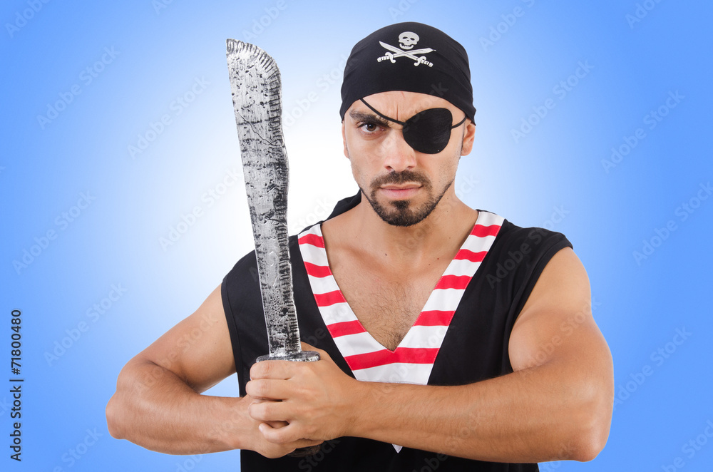 Wall mural man in pirate costume in halloween concept