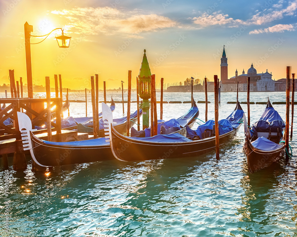 Wall mural venetian gondolas at sunrise