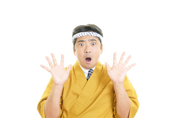 驚いた表情の料理人
