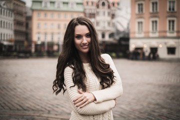 Beautiful girl in old european town