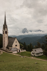 Fototapeta na wymiar St Jacob church above Val Gardena in Dolomites