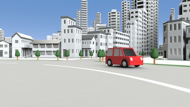 ビル街を走る自動車