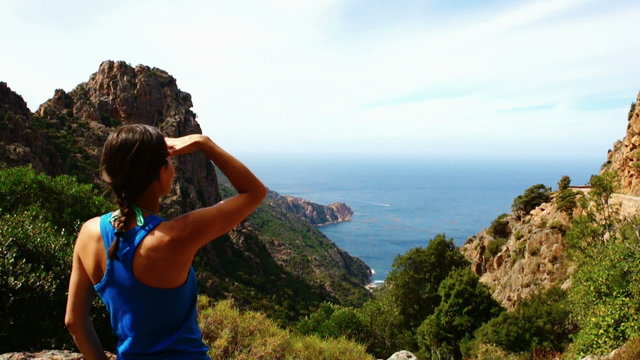 Young female tourist enjoying beautiful view, Corsica