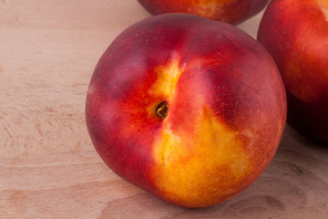 Three tasty fresh ripe juicy nectarines