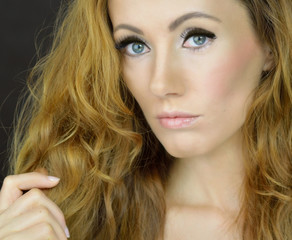Beautiful woman with curly hair