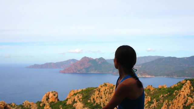 Young female tourist enjoying beautiful view, Corsica