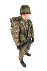 Soldier with rifle on a white background