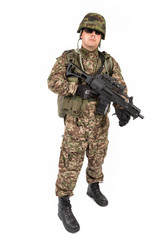 Soldier with rifle on a white background