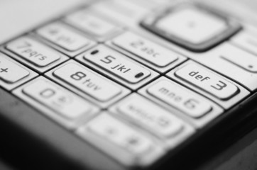 Obraz premium Cell phone keyboard - business concept