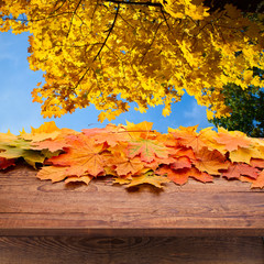 Empty wooden deck table for product montage.