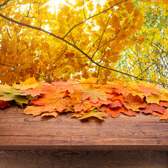 Empty wooden deck table for product montage.