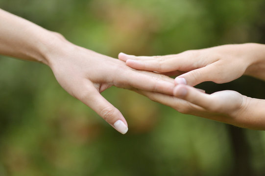Hands held together