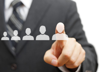 Businessman touching virtual person. Promotion,staffing,career c