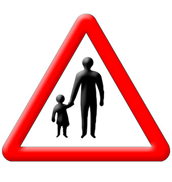 Children With Parents Crossing Traffic Sign