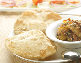 Yummy bason puri with potato curry