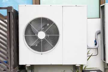 Close up air conditioners installation outside of building