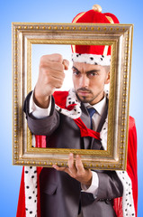 King with picture frame on white