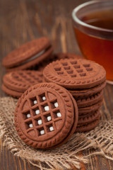 Chocolate oreo cookies with tea