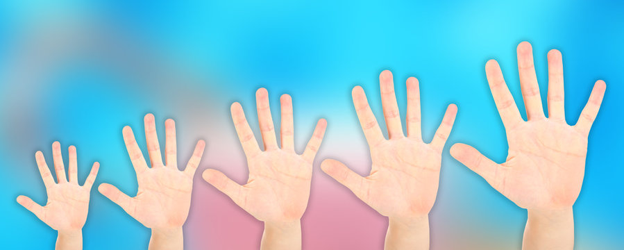 People's hands on bright background