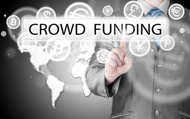 Businessman pushes virtual crowd funding button