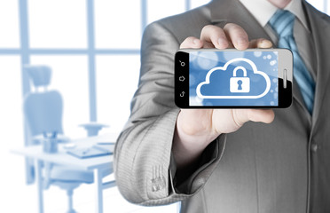 Man holds smart phone with cloud security concept