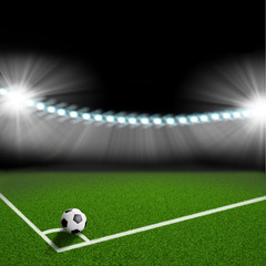 soccer ball on the green field corner
