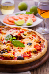 Pizza with seafood.
