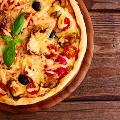 Pizza with seafood.