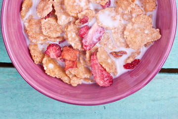 cereal with milk and dried red fruits