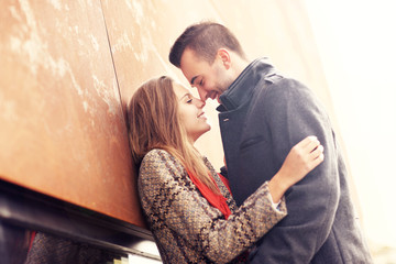 Couple kissing during autumn date