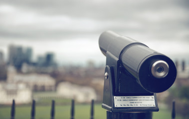 Viewing telescope overlooking a town