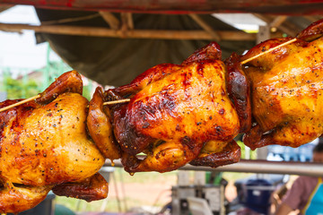 Grilled chicken  in front of the restaurant